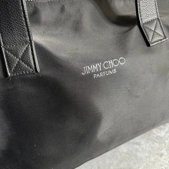 Jimmy Choo Weekend Bag, 18"L X 10"H X 10"D Adjustable Black crossbody Dufflebag - Picture 2 of 5